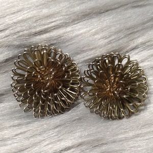 Vintage golden metal starburst clip on earring